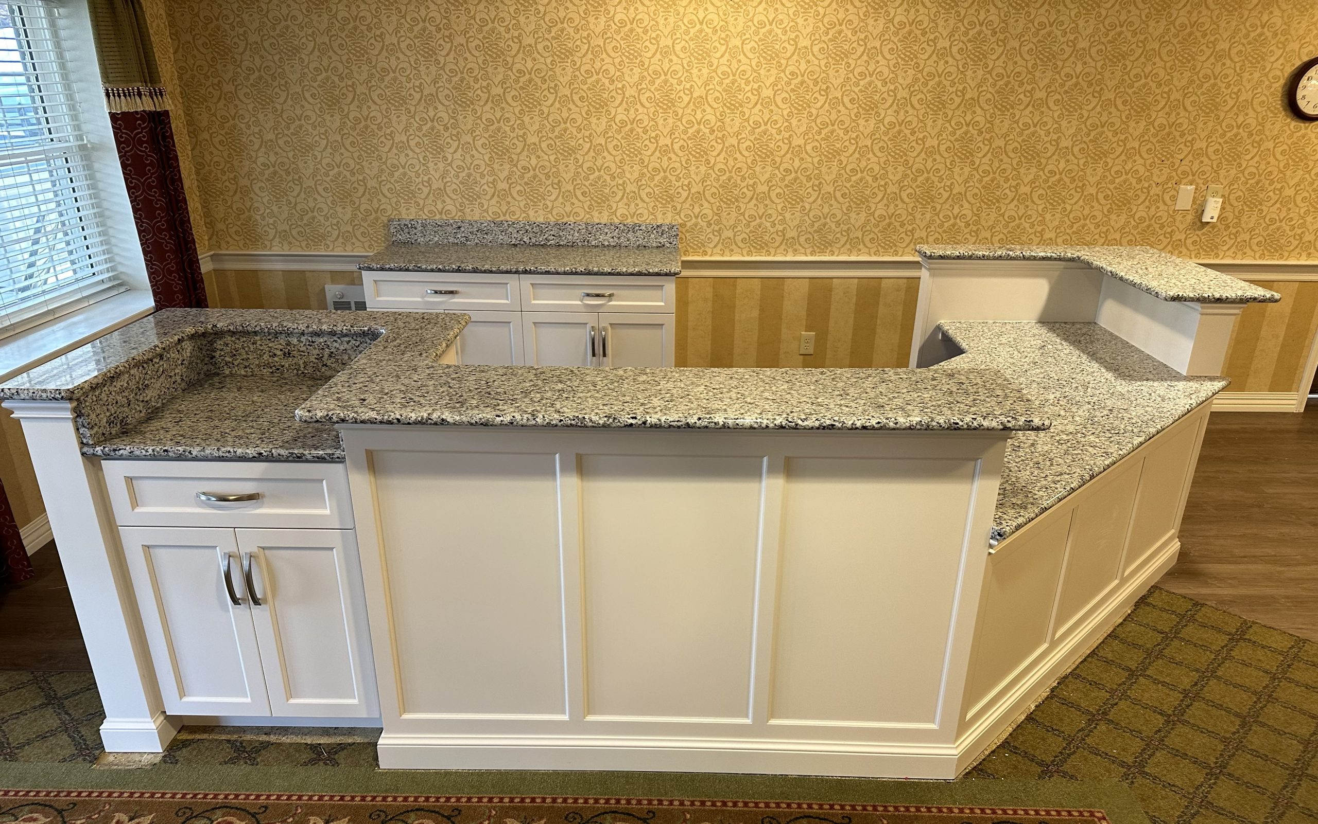 Painted commercial casework with granite work surface
